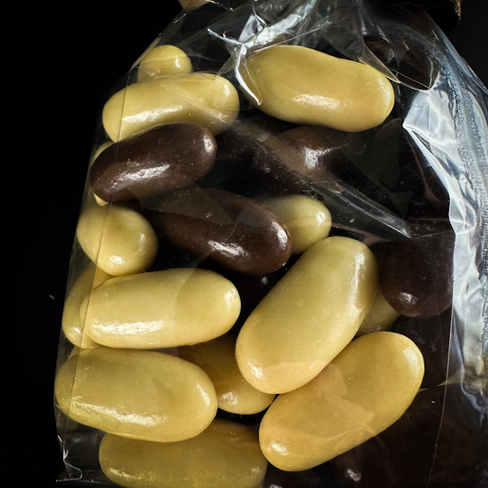 Šokolādes dražejas ar apelsīnu cukātiem miks