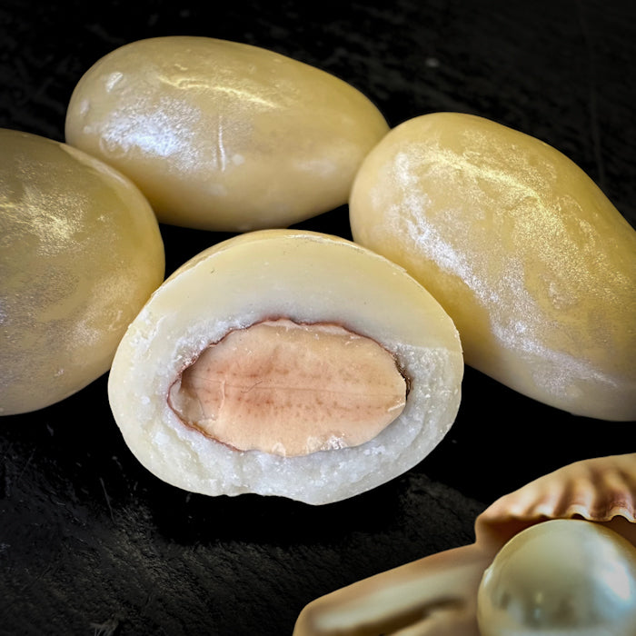 Mandeles piena šokolādē ar cukura mastikas garšu